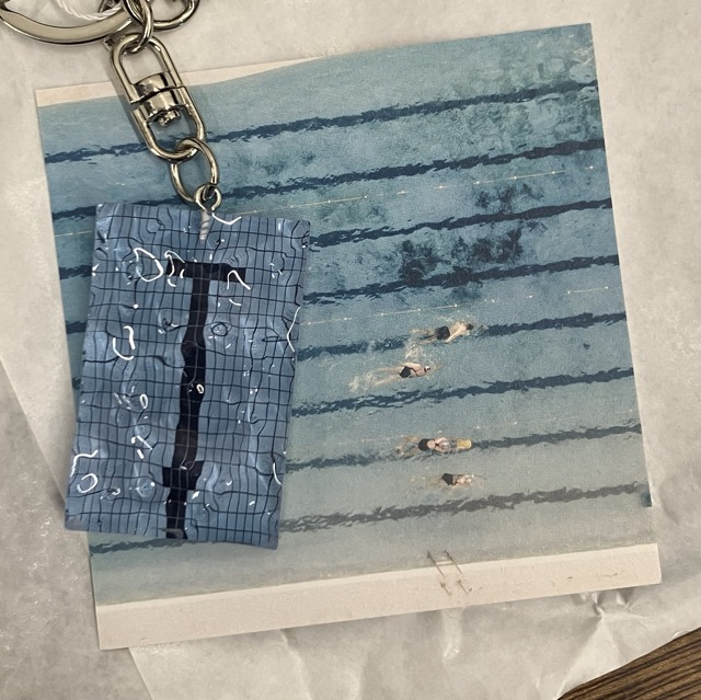 A swimming pool inspired key ring